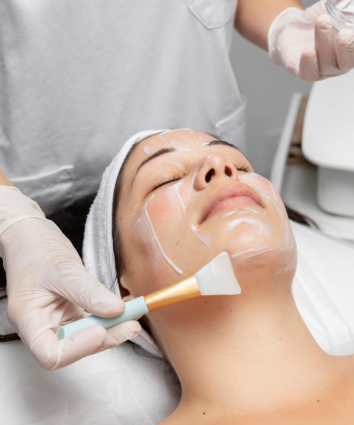 young-woman-having-facial-skincare-treatment